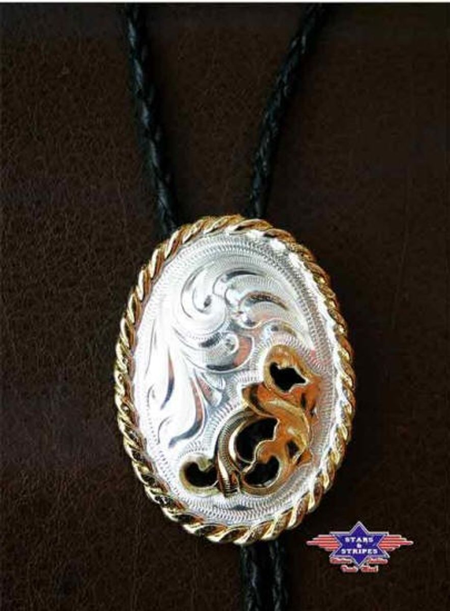 Exclusive western ties made of Alpakka(sølvlegering). Handmade with diamond cut, rhinestones, semi-precious stones, pearly or partially gilded, depending on model. Varenummer: BTM05 Pris: 490.-